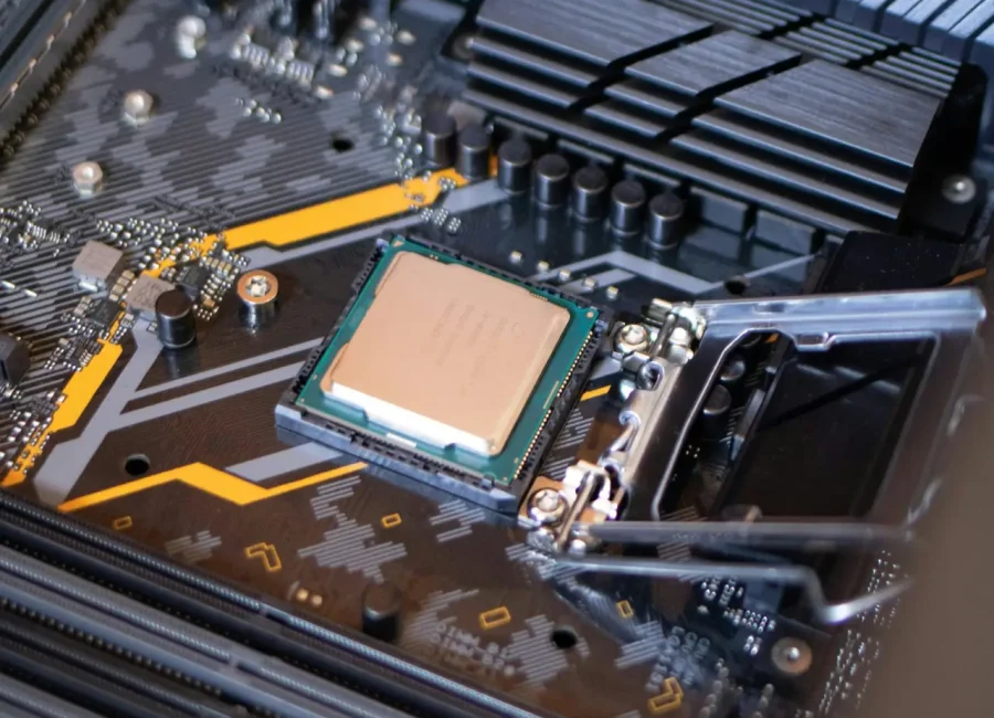 Detailed view of a motherboard with an exposed CPU, showcasing technology components.